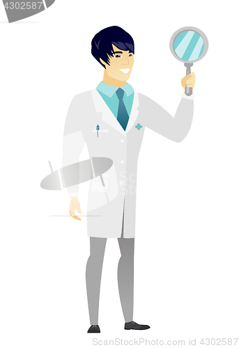 Image of Asian doctor holding hand mirror.