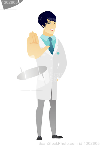 Image of Asian doctor showing palm hand.