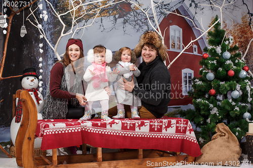 Image of Loving family with two children