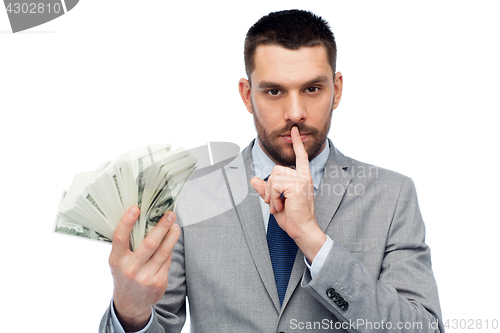 Image of businessman with american dollar money