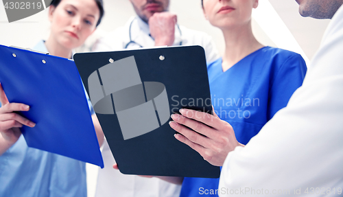 Image of close up of doctors with clipboard at hospital