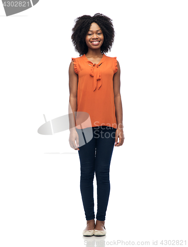 Image of happy african american young woman over white