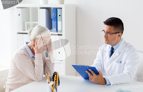 Image of senior woman and doctor meeting at hospital