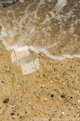 Image of wave on a sandy beach