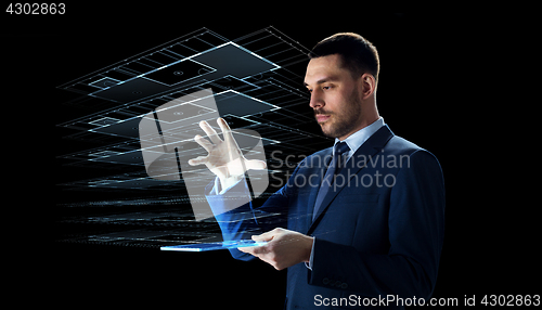 Image of businessman with tablet pc and virtual building