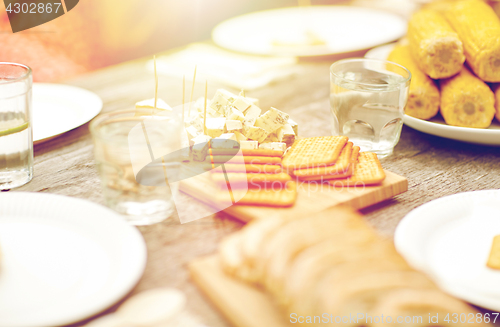 Image of table with food for dinner at summer garden party