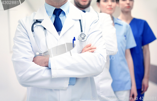 Image of close up of medics or doctors at hospital corridor