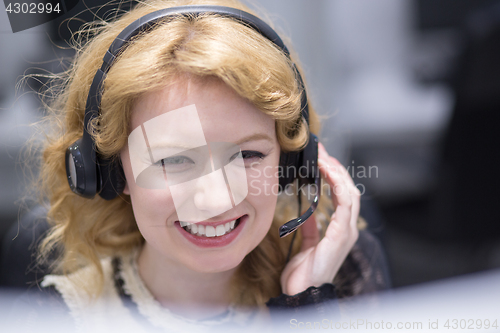 Image of female call centre operator doing her job