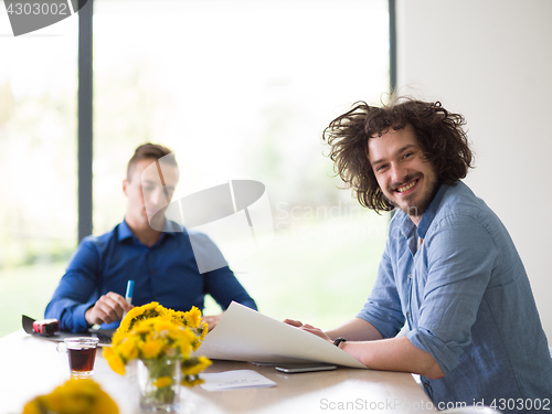 Image of Startup Business Team At A Meeting at modern office building