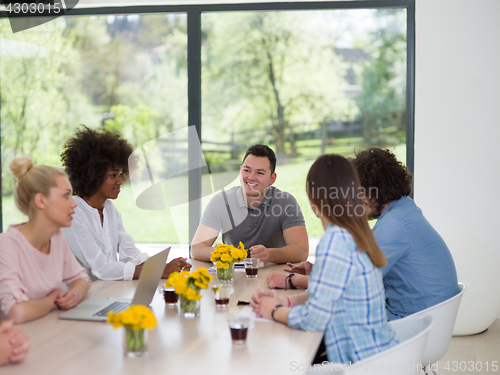 Image of Multiethnic startup Business Team At A Meeting at modern office 