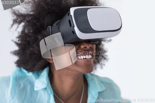 Image of black girl using VR headset glasses of virtual reality