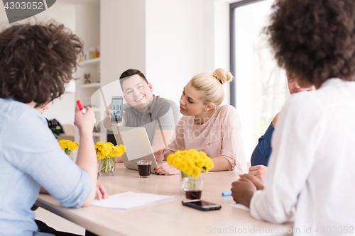 Image of Multiethnic startup business team on meeting