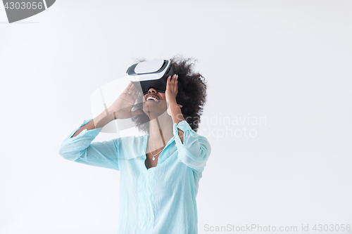 Image of black girl using VR headset glasses of virtual reality