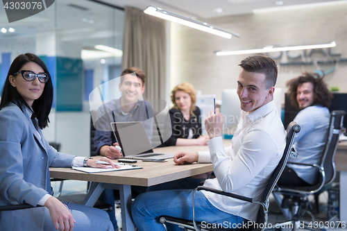 Image of Startup Business Team At A Meeting at modern office building