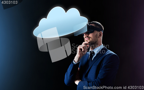 Image of businessman in virtual reality headset with cloud