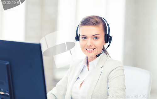 Image of friendly female helpline operator