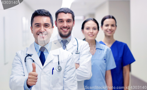 Image of medics or doctors at hospital showing thumbs up