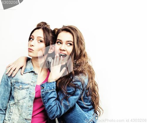 Image of best friends teenage girls together having fun, posing emotional on white background, besties happy smiling, lifestyle people concept close up