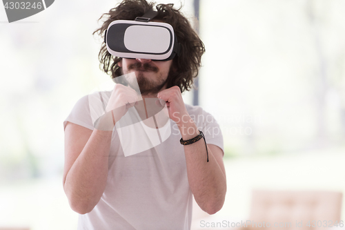 Image of man using VR-headset glasses of virtual reality