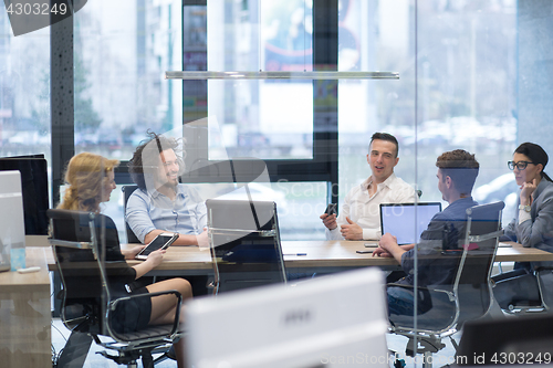 Image of Startup Business Team At A Meeting at modern office building
