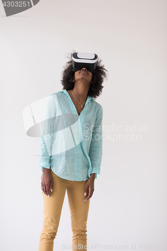 Image of black girl using VR headset glasses of virtual reality