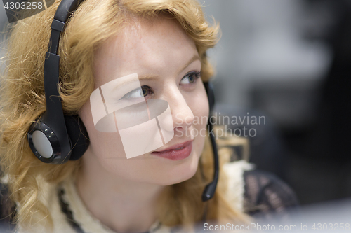 Image of female call centre operator doing her job