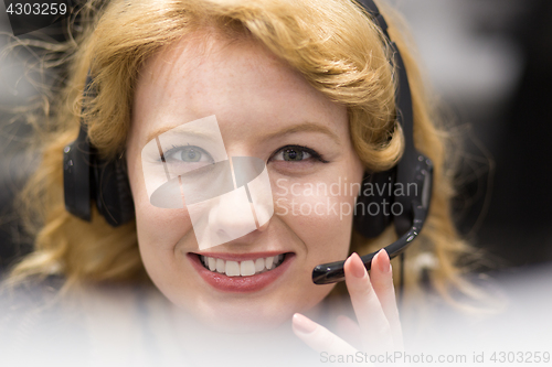 Image of female call centre operator doing her job