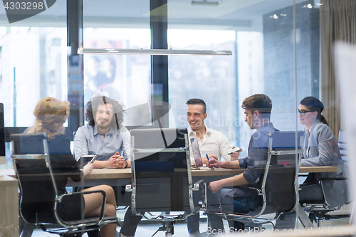 Image of Startup Business Team At A Meeting at modern office building