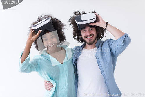 Image of multiethnic couple getting experience using VR headset glasses