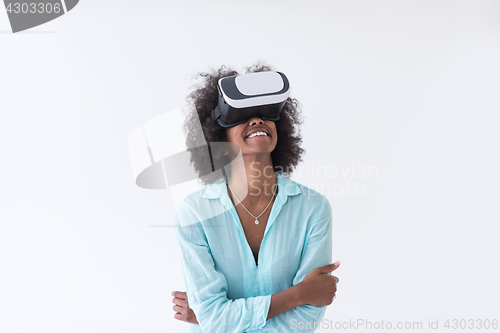 Image of black girl using VR headset glasses of virtual reality