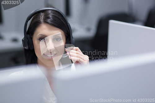 Image of female call centre operator doing her job