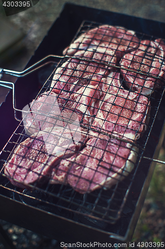 Image of Grilling fresh entrecote pork