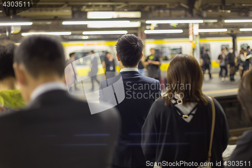 Image of Passengers traveling by Tokyo metro.