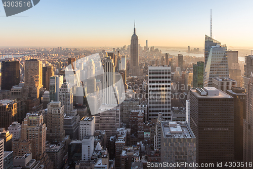 Image of New York City Manhattan downtown skyline at sunset.