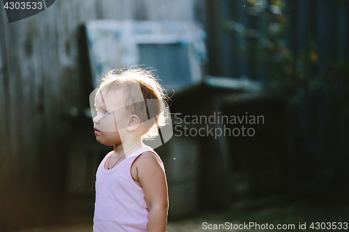 Image of Child playing in backyard