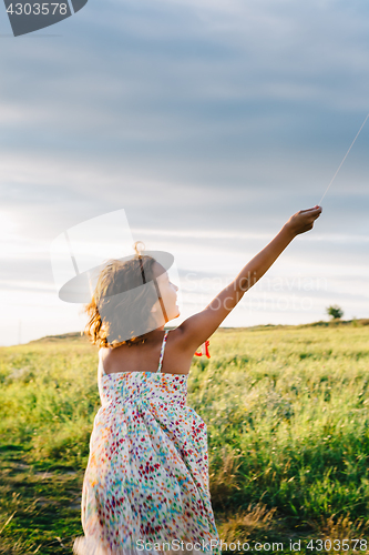 Image of Anonymous girl with kite