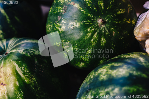 Image of Watermelons in box for sale