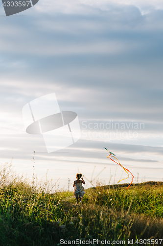 Image of Anonymous girl with kite