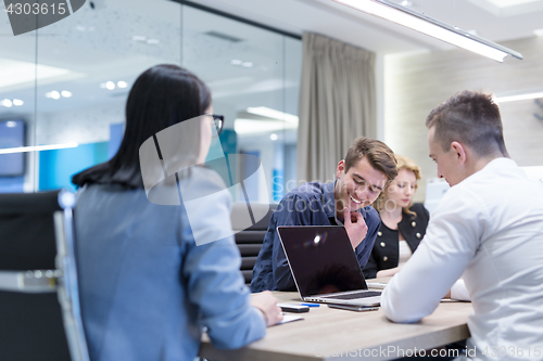 Image of Startup Business Team At A Meeting at modern office building