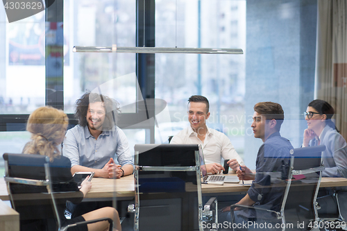 Image of Startup Business Team At A Meeting at modern office building