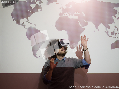 Image of businessman using VR-headset glasses of virtual reality