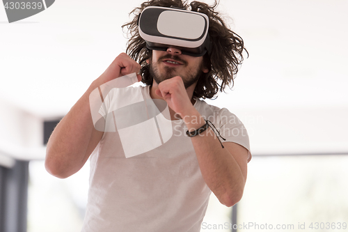 Image of man using VR-headset glasses of virtual reality