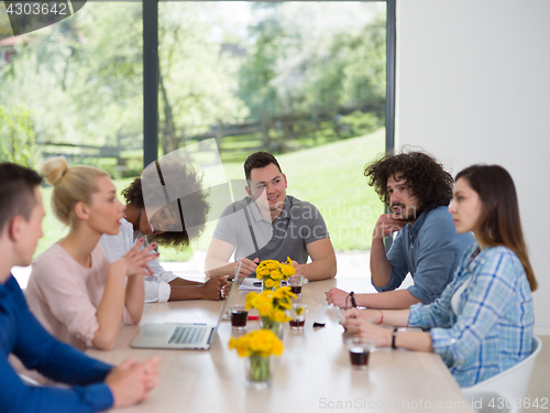 Image of Multiethnic startup Business Team At A Meeting at modern office 
