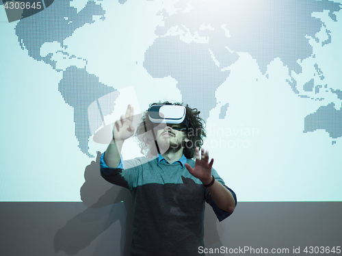 Image of businessman using VR-headset glasses of virtual reality