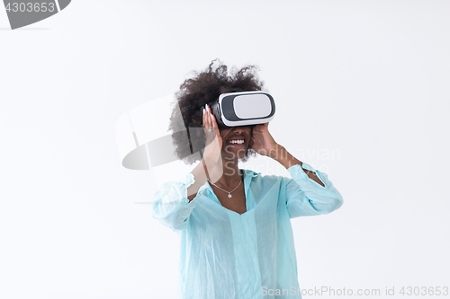 Image of black girl using VR headset glasses of virtual reality