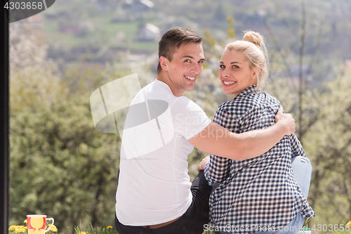 Image of couple enjoying morning coffee