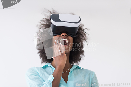 Image of black girl using VR headset glasses of virtual reality