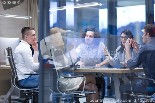 Image of Startup Business Team At A Meeting at modern office building