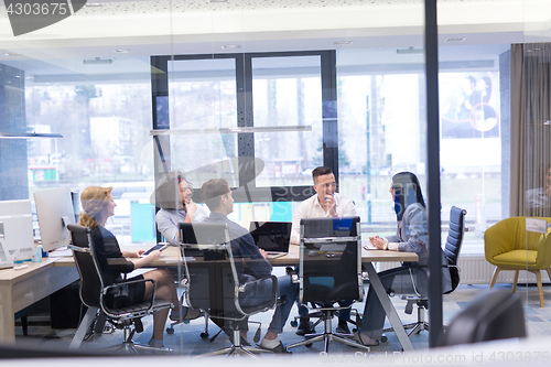 Image of Startup Business Team At A Meeting at modern office building