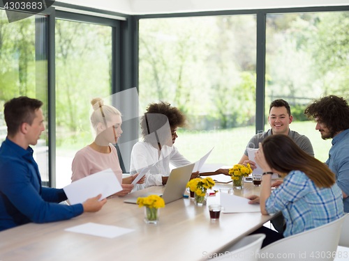 Image of Multiethnic startup Business Team At A Meeting at modern office 